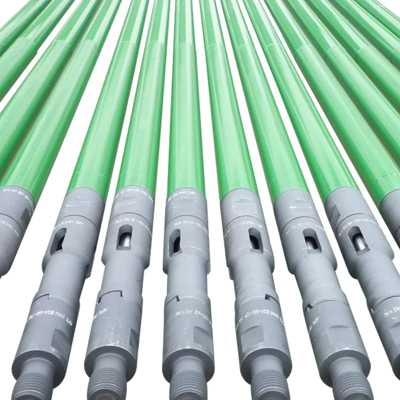 ULT downhole sucker rod pumps lined up, showing pump barrels and fittings